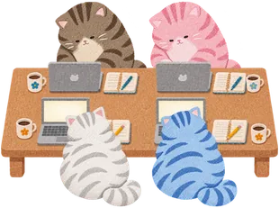Four cats studying at a big table