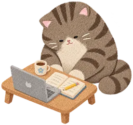 A tabby cat studying at its own little table
